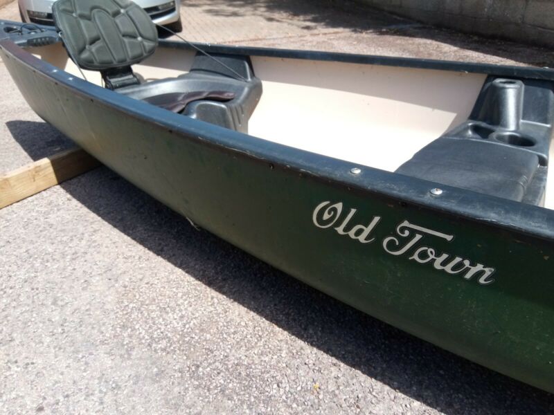 Old Town Saranac 146XT Canadian Canoe Inc Paddles And Two 