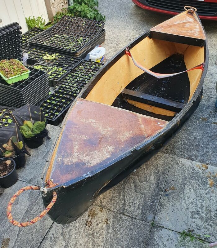 Small Homemade Wooden Boat/sort've Canoe Thing Does