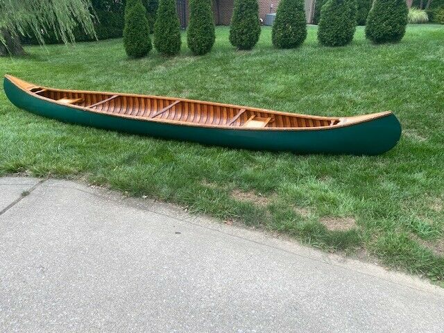 Vintage Shell Lake Wood And Canvas Canoe for sale from United States