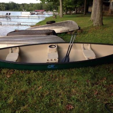 old town sport 14' green canoe with 2 paddles for sale